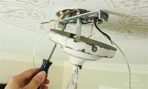 how to hang chandelier from junction box|chandelier junction box installation.